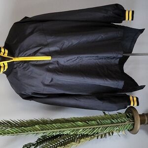 Birdie by Richard A. Leslie black and yellow half zip pullover